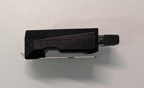 Side view of the dongle with a hook
